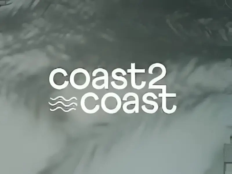 "Coast2Coast brand logo with text and wave graphic against a dark, textured background."