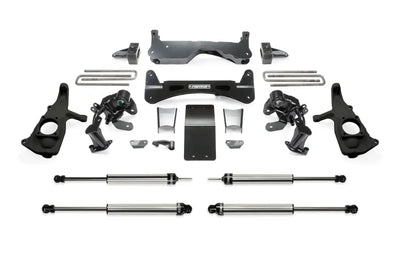 K1046DL Fabtech Lift Kit Suspension components arranged, showcasing durable construction for enhanced off-road capability and improved ride quality, offering a customized look.