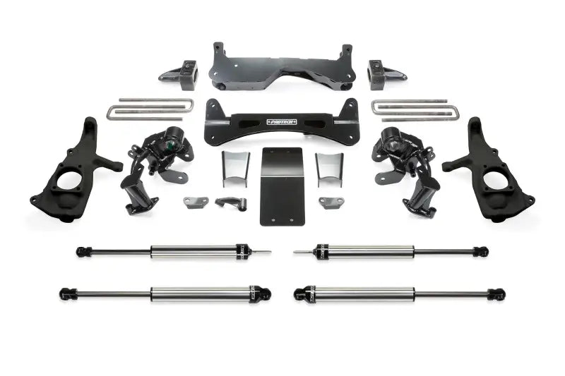 K1046DL Fabtech Lift Kit Suspension components arranged, showcasing durable construction for enhanced off-road capability and improved ride quality, offering a customized look.