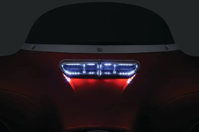 Chrome Kuryakyn fairing vent accent on 2019 BMW M5 rear light