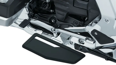Kuryakyn Omni Driver Floorboards Chrome showing motorcycle footrest with chrome accents
