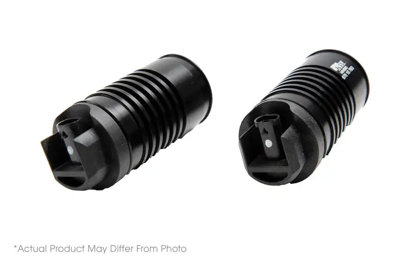 Black rubberized KW electronic damping cancellation caps for VW Eos