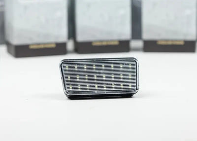 Rectangular LED license plate light with chrome trim for Wrangler LFZ17 Morimoto XbLd
