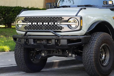 License Plate Relocation Kit Relocates Below The Center At An Angle On Front Bumper; Powder Coated; Black; Steel