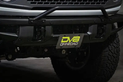 License Plate Relocation Kit Relocates Below The Center At An Angle On Front Bumper; Powder Coated; Black; Steel