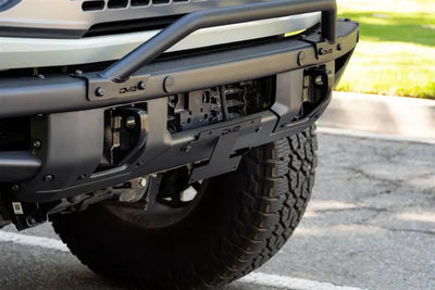 License Plate Relocation Kit Relocates Below The Center At An Angle On Front Bumper; Powder Coated; Black; Steel
