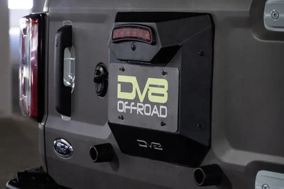 License Plate Relocation Kit Relocates To OEM Spare Tire Location Once Removed; Retains Light mount/ Back-up Camera
