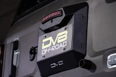 License Plate Relocation Kit Relocates To OEM Spare Tire Location Once Removed; Retains Light mount/ Back-up Camera