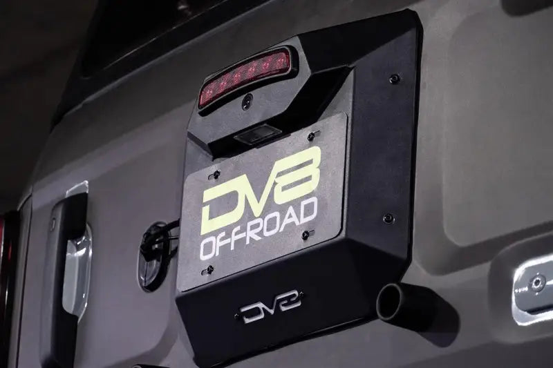 License Plate Relocation Kit Relocates To OEM Spare Tire Location Once Removed; Retains Light mount/ Back-up Camera
