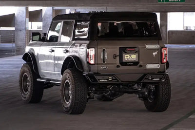 License Plate Relocation Kit Relocates To OEM Spare Tire Location Once Removed; Retains Light mount/ Back-up Camera