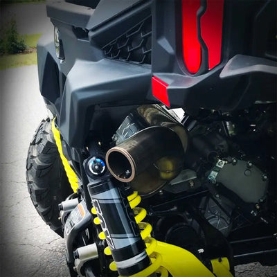 Black and yellow off-road vehicle rear, Can-Am Maverick Trail Sport Series exhaust