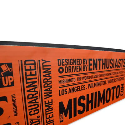 Mishimoto Aluminum Radiator Packaging with bold typography displaying guarantees and product information.