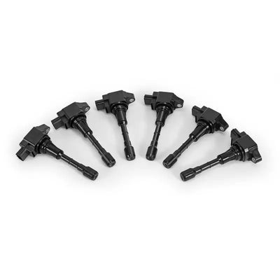 Six black ignition coils from Mishimoto Nissan 370Z ignition coil set for easy upgrade