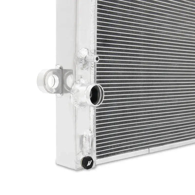 Mishimoto 2016+ Toyota Tacoma 2.7L/3.5L Performance Aluminum Radiator close-up showing high-quality aluminum construction and precision-engineered design.