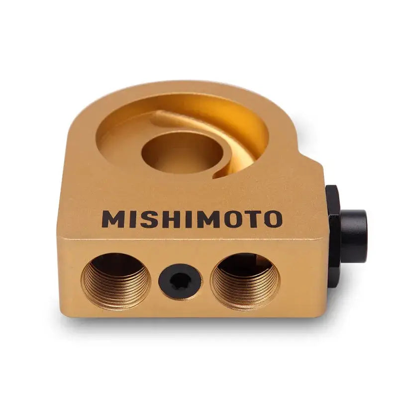 Gold-colored oil filter adapter for Subaru WRX thermostatic oil cooler kit