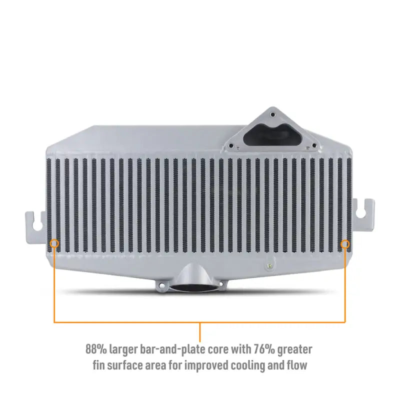 Silver intercooler with mounting brackets from Mishimoto WRX TMIC kit featuring red pipes
