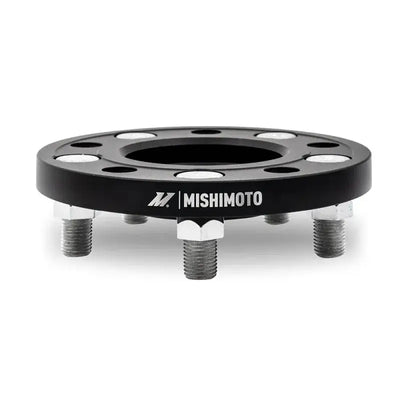Black Mishimoto 5x114 15mm wheel spacers with studs for better fitment
