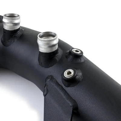 Black metal charge pipe with silver fittings for Mishimoto BMW N54 engine buildup