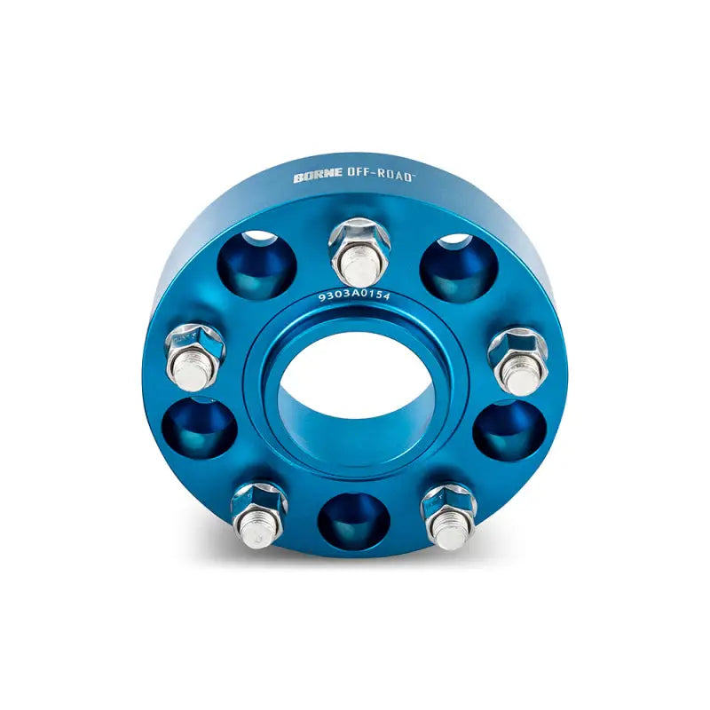 Blue Mishimoto Borne off-road wheel spacers with bolts for improved fitment