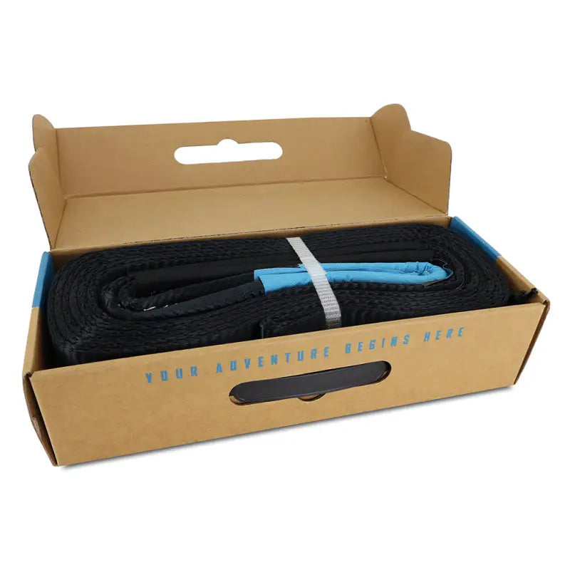 Black Mishimoto Tree Saver recovery strap in cardboard box for safe tree rescue