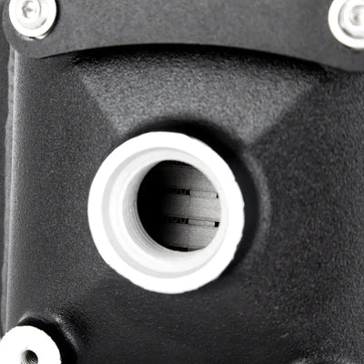 Black metal mishimoto universal air-to-water intercooler part with white rimmed hole