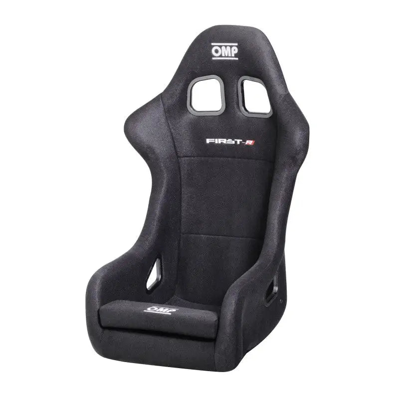 Black OMP First Series car seat with ergonomic design and side supports.