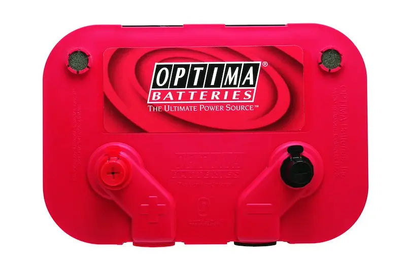 Bright red Optima battery with black caps for truck accessories