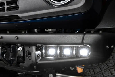 Black truck bumper with integrated fog light kit for Ford Bronco in white