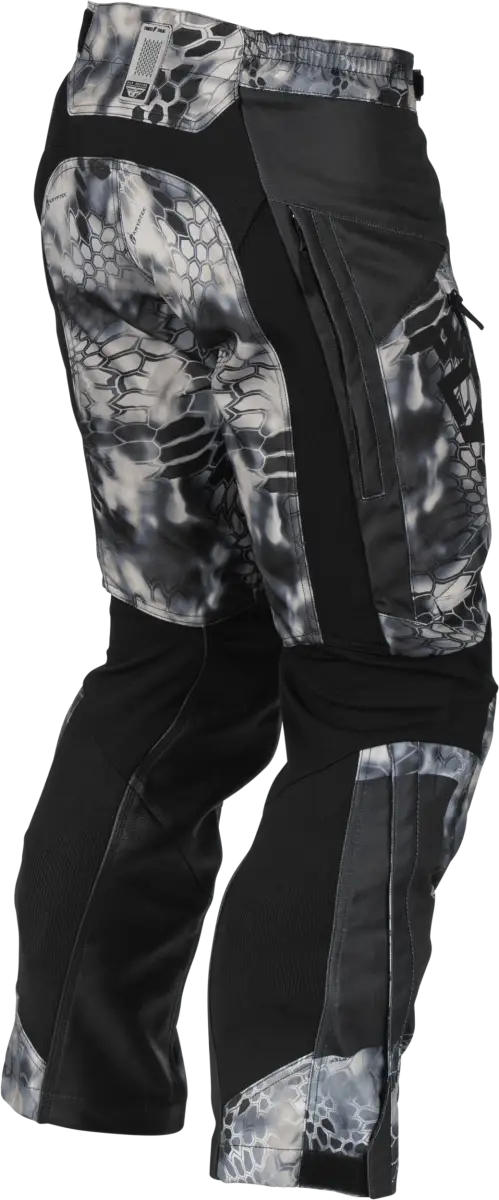 Black and white camouflage Patrol Kryptek Over Boot Pants with easily accessible lower leg zippers