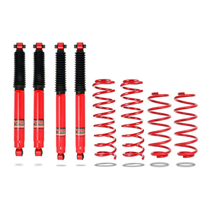 Red titanium shocks and coil springs in Pedders Jeep Gladiator TrakRyder lift kit