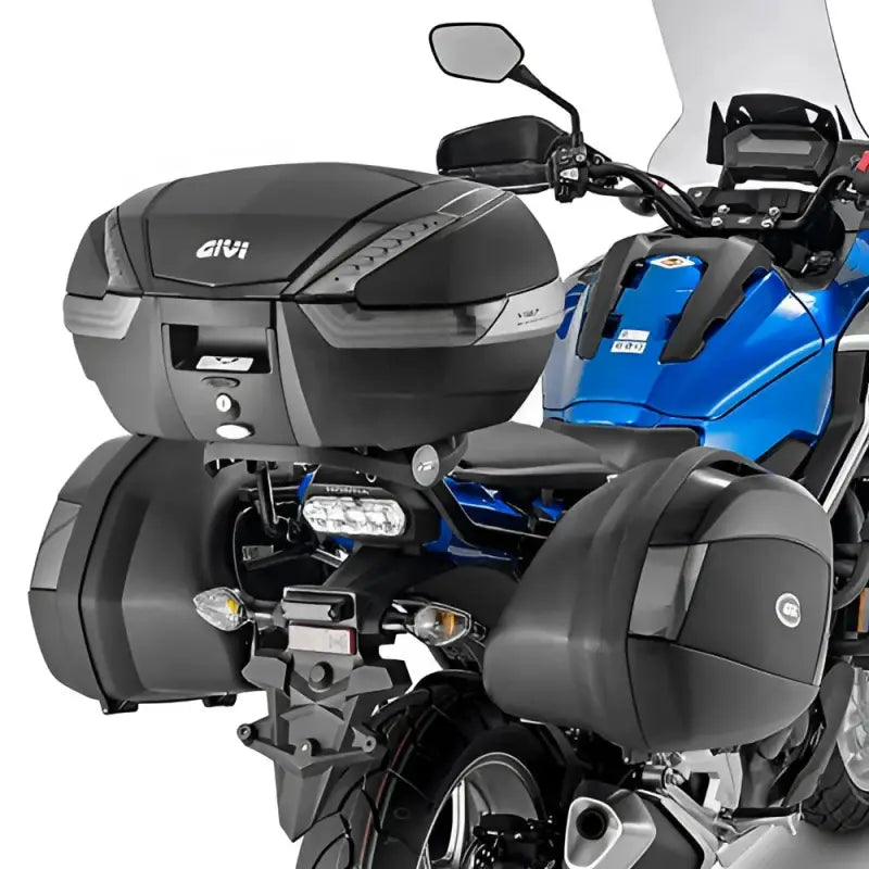 Blue motorcycle with matte black Givi hard luggage mounting hardware and cases