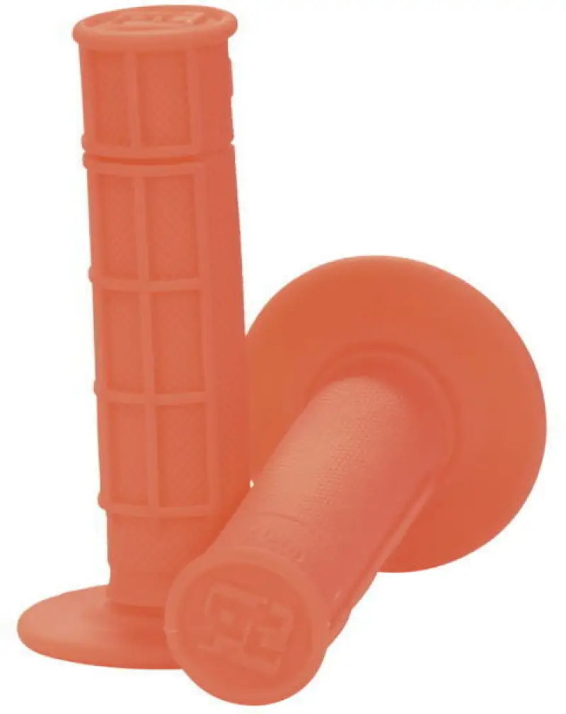 Orange motorcycle handlebar grips with neon red waffle grips for enhanced grip performance