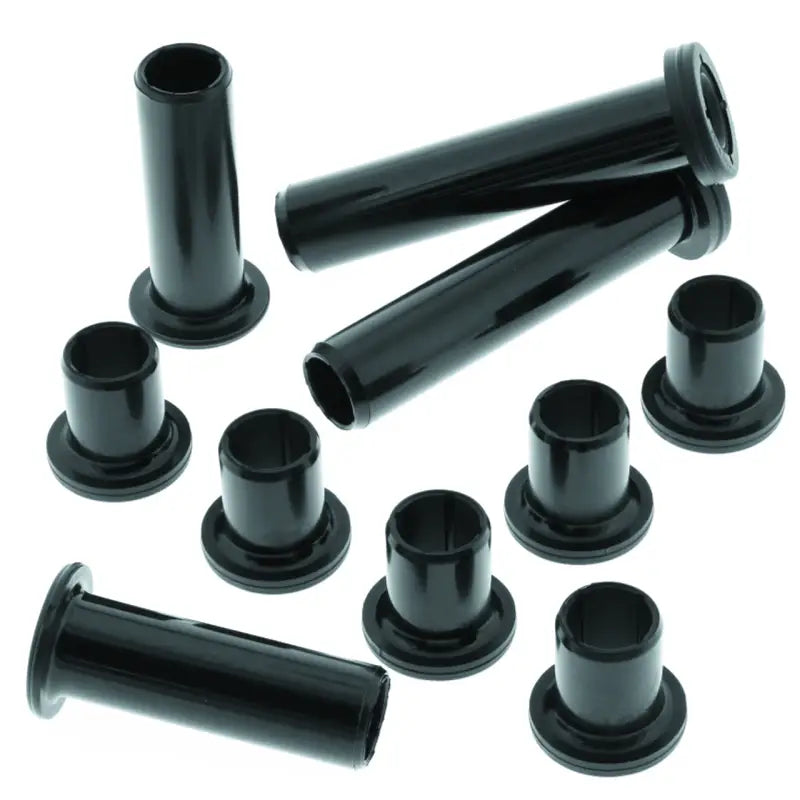 Black cylindrical bushings with flared ends for Polaris Scrambler rear independent suspension