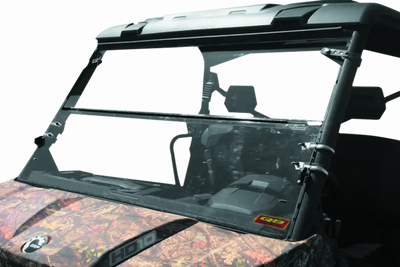 Camouflage utility vehicle with windshield showing Can-Am Defender HD10 windbreak folding windshield