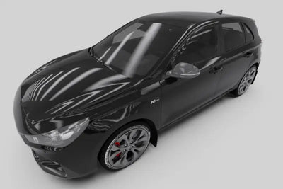 Black hatchback car featuring Rally Armor mud flaps on a Hyundai Elantra N Line