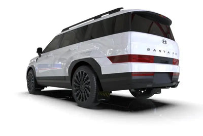 White Hyundai Santa Fe Black SUV with Rally Armor mud flaps featuring white logo