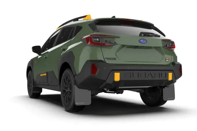 Green Subaru Crosstrek Wilderness SUV with Rally Armor Black UR Mud Flap and Red Logo