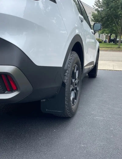 White 2019 Ford Mustang Mach-E with black urethane mud flaps