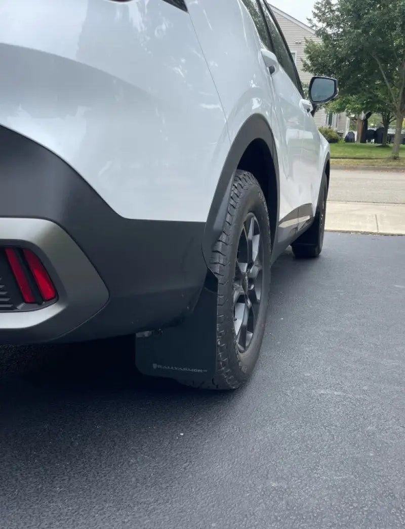 White 2019 Ford Mustang Mach-E with black urethane mud flaps