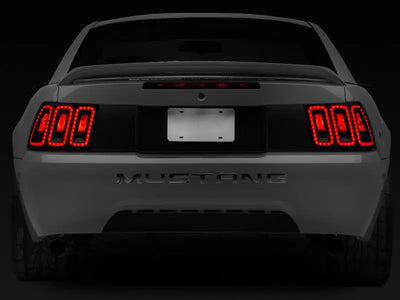 Raxiom 99-04 Ford Mustang Excluding 99-01 Cobra Icon LED Tail Lights- Black Housing (Smoked Lens) - Truck & Automotive