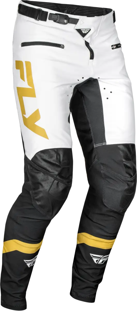 White and black motocross pants with gold accents featuring durable stretch technology