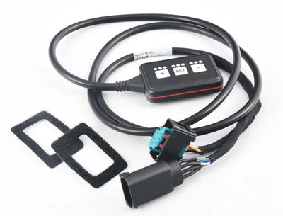 Remus Throttle Responder black tuning module with coiled cable and buttons