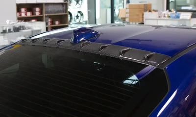 Blue car with vortex generator and rear window louvers on Revel GT Carbon Toyota GR86