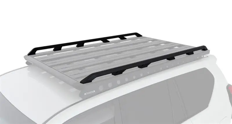Black roof rack on vehicle using Rhino Rack Pioneer Side Rails for 1328mm length