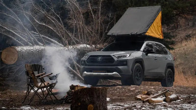 Gray SUV with black anodized roof rack and rooftop tent for adventure ready setups