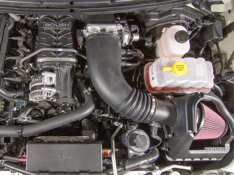 ROUSH 2011-2014 Ford F-150 6.2L V8 Phase 2 Calibrated Supercharger Kit, enhanced performance, 590HP, engine bay view.