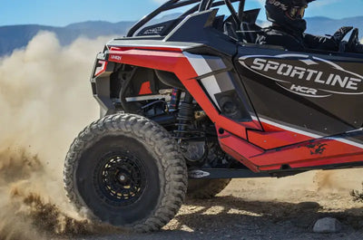 Red and black off-road vehicle with Daystar HCR Suspension for rugged adventures