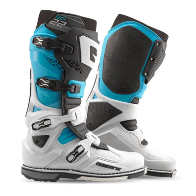 Two Gaerne SG-22 motocross boots in white and blue for guard dual riding gear