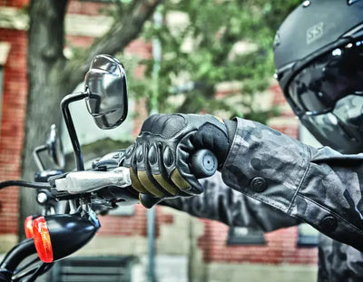 Motorcycle rider wearing Speed and Strength Call to Arms Gloves Brown small arm gloves