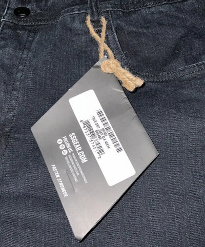 Dark denim jeans with attached tag from Speed and Strength True Grit denim collection